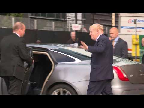 UK PM Boris Johnson arrives at his Conservative party's conference in Manchester