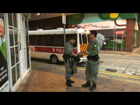 Security presence at Beijing Liaison office beffed up in HK on China's National Day