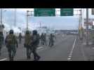 Indigenous people and armed forces clash in Ecuador during march