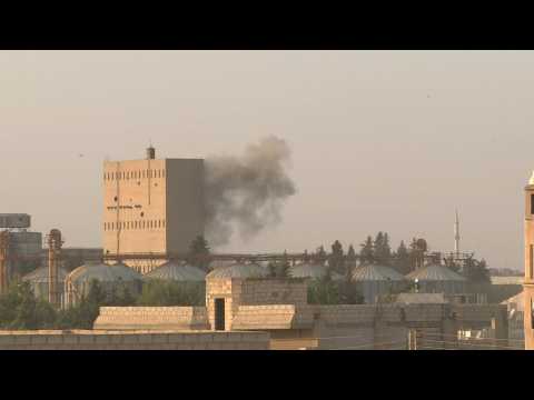 Syrians flee after Turkish assault on Syrian Kurdish sites