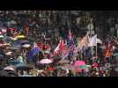 Myriads of flags and masks as Hong Kong democracy crowds defy police