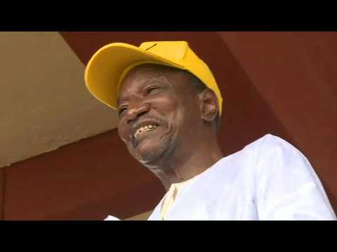 Guinea's President Conde holds last rally before elections