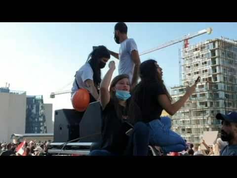 Hundreds of Lebanese mark 1st anniversary of their protest movement