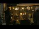 Pedestrians rush home and restaurants close as curfew begins in Paris