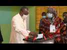 Guinean President Alpha Conde casts vote as he bids for third term