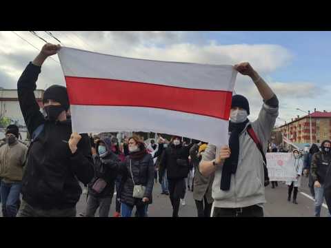 Tens of thousands march in Belarus despite police threat to open fire