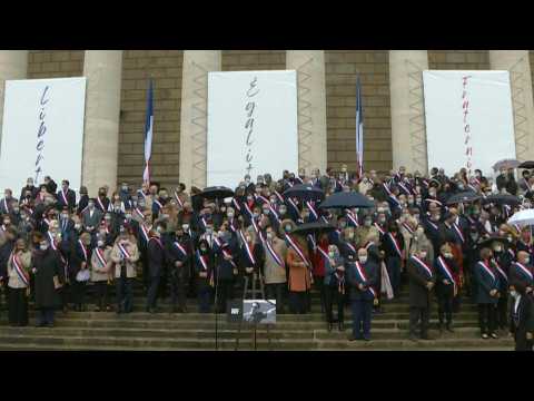 French MPs hold minute of silence in homage to beheaded teacher