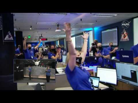 Scientists celebrate as NASA probe touches down on asteroid Bennu