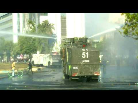 Chilean police disperse protesters with water cannons ahead of vote