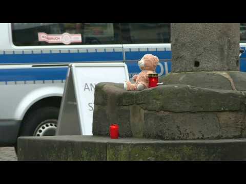 Trier residents place candles after driver kills five people