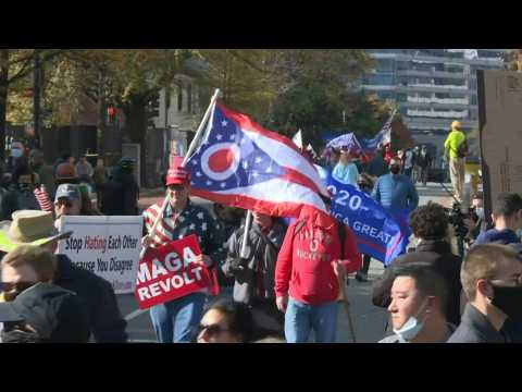 Supporters and opponents of President Trump gather ahead of rally