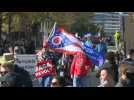 Supporters and opponents of President Trump gather ahead of rally