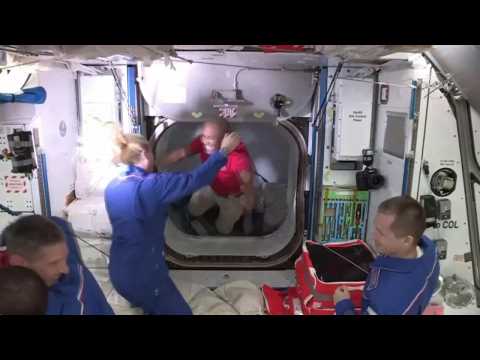 Hugs, high fives as astronauts enter ISS after SpaceX docking
