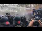 Police fire water cannon to disperse Berlin anti-shutdown protest