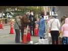 US: Washington DC residents line up at testing site as Covid-19 cases rise