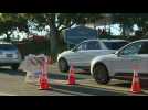 Angelenos flock to Dodger Stadium Covid-19 testing center as virus cases surge