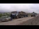Armenian police and Russian peacekeepers on the new border line between Armenian and Azerbaijani sides