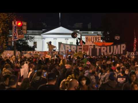 Celebrations continue into the night near the White House after Biden win
