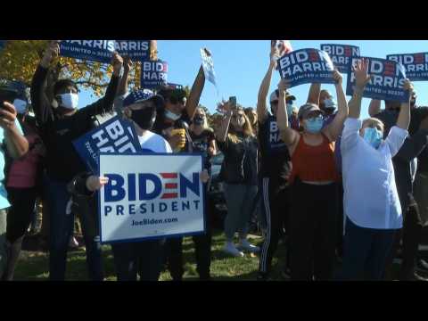 Biden supporters celebrate outside Wilmington venue where he will speak Saturday night
