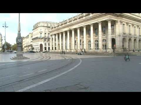 Police patrol empty streets of Bordeaux in France's first weekend of lockdown