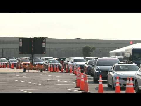 Cars line up at Miami's Hard Rock Stadium testing site as Covid-19 cases rise