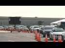 Cars line up at Miami's Hard Rock Stadium testing site as Covid-19 cases rise