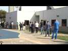 Texas residents line up in Houston for early in-person voting