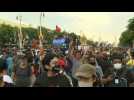 Defiant protesters march during pro-democracy rally in tense Bangkok