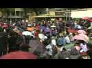 Early-bird protesters gather in Bangkok as tensions rise