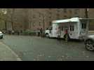 New Yorkers line up outside a Covid-19 test site in Brooklyn
