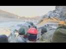 Front loaders used in Indian glacier disaster rescue operation