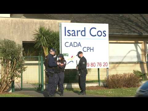 Police guard French asylum centre where migrant killed official