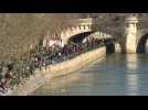 Parisians enjoy sunny weather as lockdown threat looms