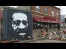 Flowers at the George Floyd Mural in Minneapolis ahead of trial for US policeman charged with Floyd's death