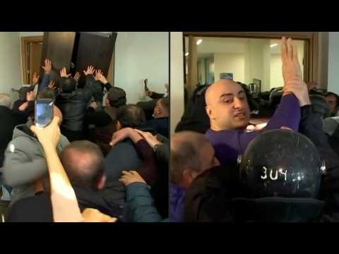 Georgian police arrest top opposition leader, use tear gas in party HQ raid
