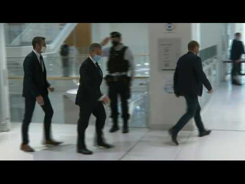 Ex-president Nicolas Sarkozy leaves French court after being convicted for corruption