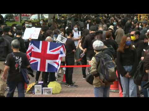 Crowds gather outside court after Hong Kong dissidents charged