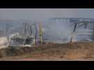 Aftermath of massive fuel tankers fire on Afghanistan-Iran border
