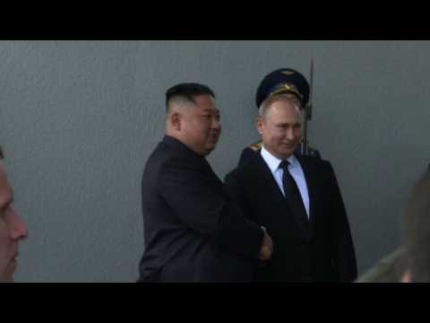Putin, Kim shake hands for start of summit