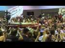 Coffin of Peru's ex-President arrives at his party's HQ