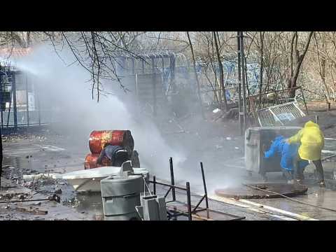 Greek army fires water cannon at migrants on the Turkish side of the border