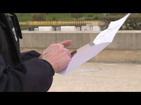 Coronavirus: French police patrol the empty streets of Paris