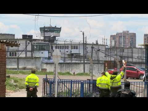 Forensics, police, relatives at Bogota jail after riot leaves 23 dead