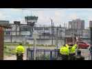 Forensics, police, relatives at Bogota jail after riot leaves 23 dead