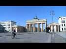 Berlin's Brandenburg Gate almost empty as Germany tightens measures over coronavirus spread