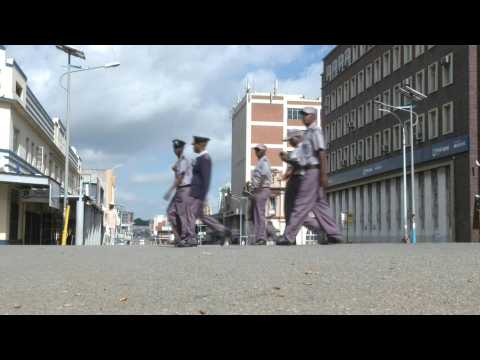 Coronavirus: Zimbabwe police patrol empty streets as lockdown begins