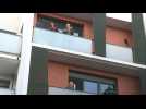Coronavirus: Residents in Paris outskirts clap, sing for healthcare workers