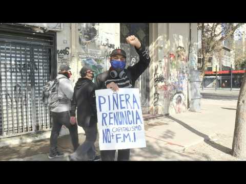 Dozens gather for May Day protest in Chile's capital despite lockdown