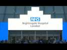 Medical workers at NHS Nightingale field hospital take part in weekly 'Clap for Carers'