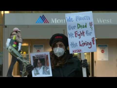 New York: Healthcare workers hold vigil for colleagues who died from Covid-19